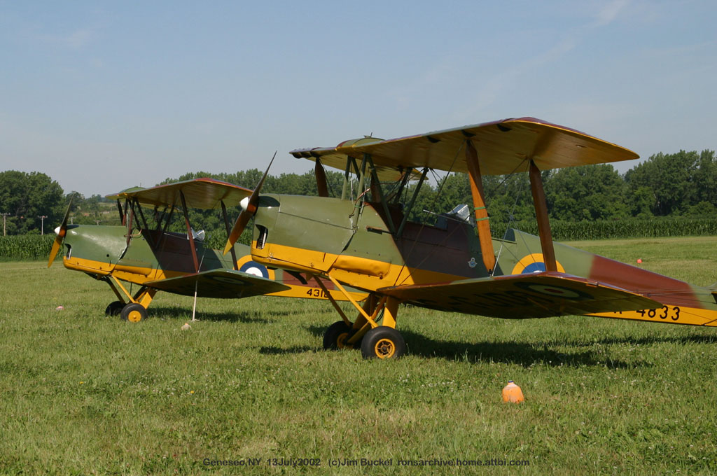 2002_07_13_Tiger_Moths_R4833_C-GJDO_and_0640_C-FCJX_02